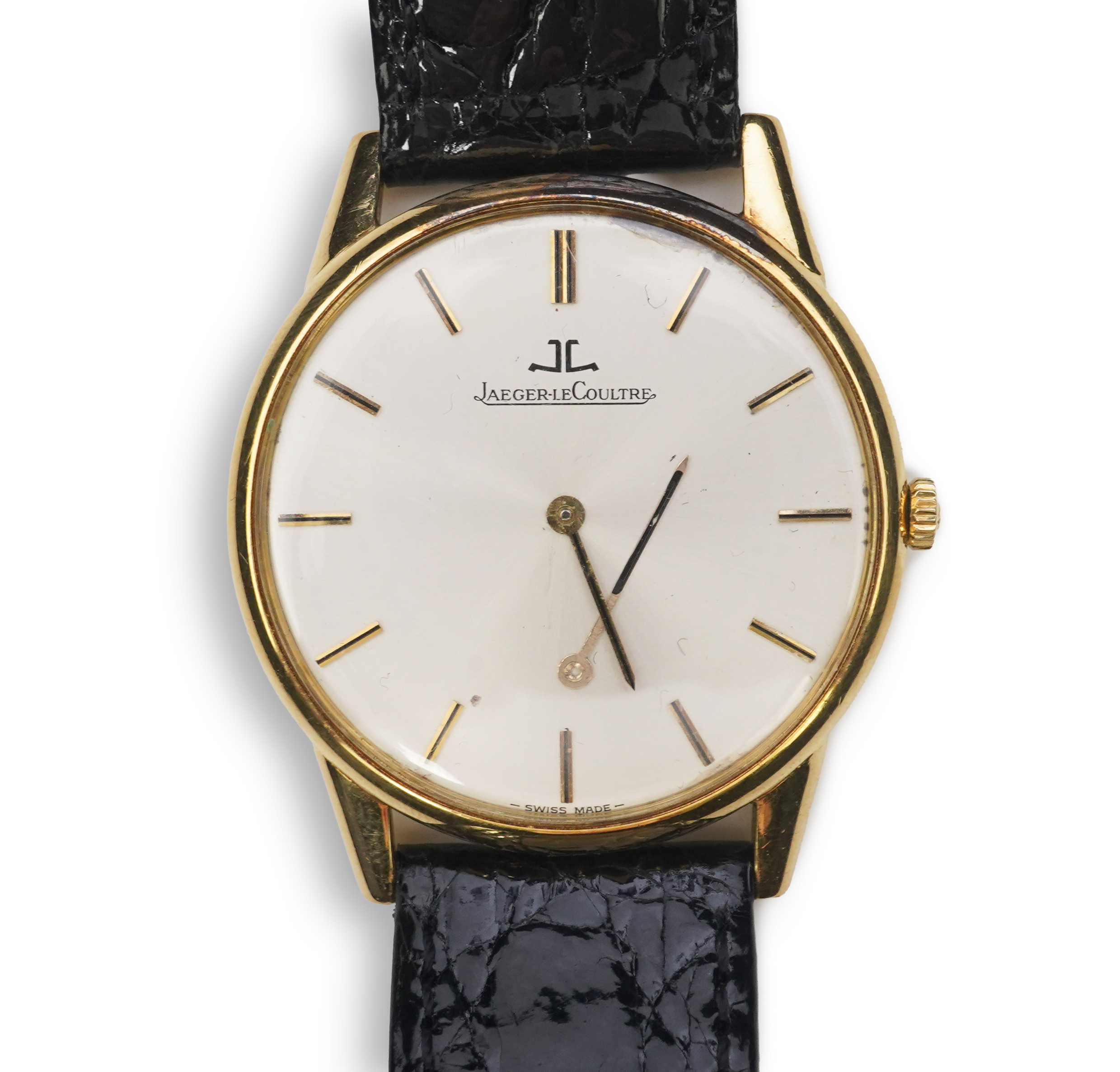 A gentleman's 18ct gold Jaeger LeCoultre manual wind dress wrist watch, on a later associated leather strap